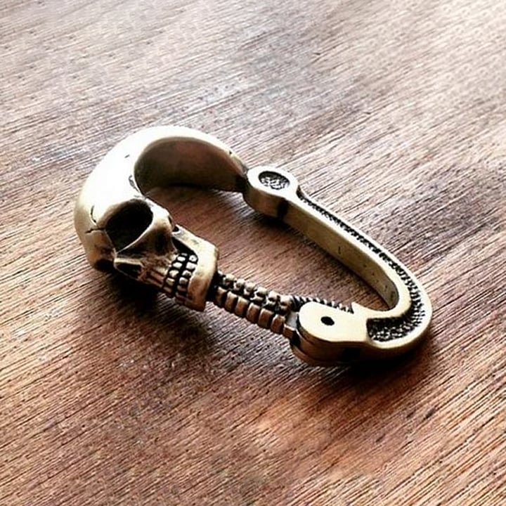 Novel Skull Carabiner with Articulated Cervical Column Clasp