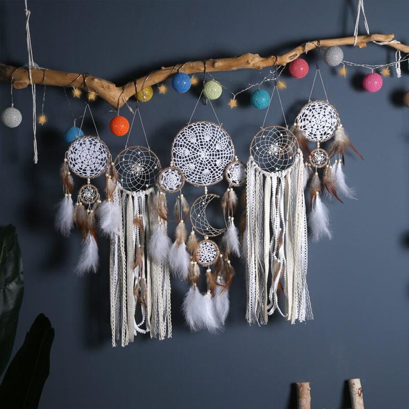 Dream catcher moon and stars hanging over the bed