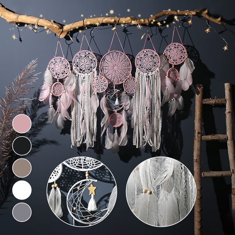 Dream catcher moon and stars hanging over the bed