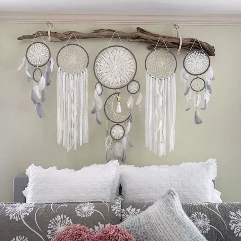 Dream catcher moon and stars hanging over the bed